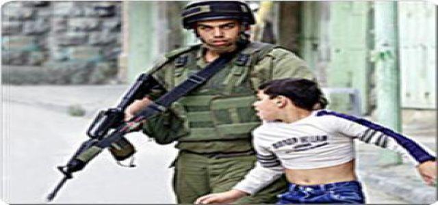 IOF soldiers torture two Palestinian children, try to maim one of them