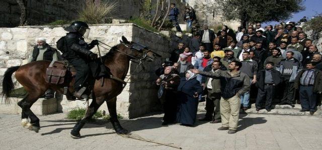 Foreign activist, 15 Palestinians wounded in IOF quelling of anti wall marches